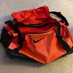 Orange Nike duffel bag